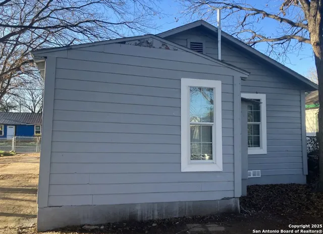 a front view of a house with garage