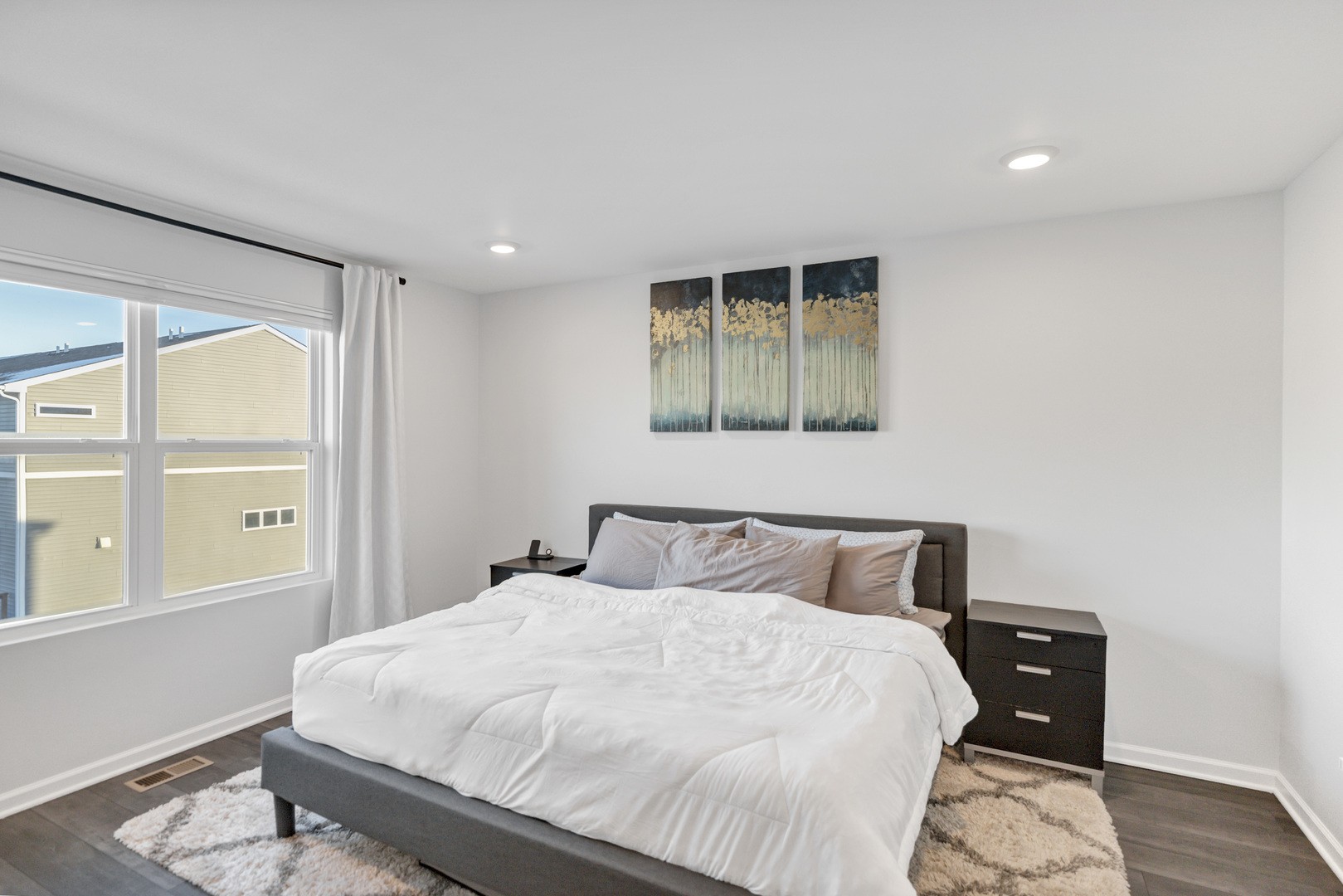 3209 Trillium Circle Rolling Meadows, IL 60008 - Photo 14 of 30 a bedroom with a bed and wooden floor