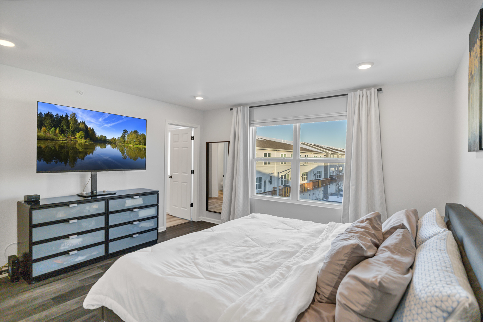 3209 Trillium Circle Rolling Meadows, IL 60008 - Photo 15 of 30 a bedroom with a bed and a flat screen tv