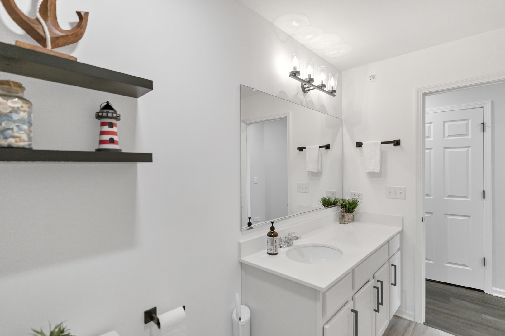 3209 Trillium Circle Rolling Meadows, IL 60008 - Photo 24 of 30 a bathroom with a sink and a mirror