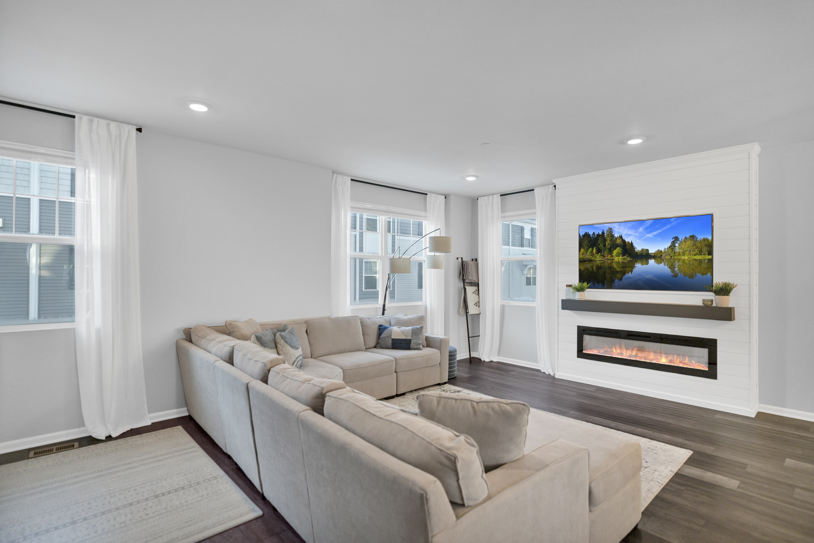 3209 Trillium Circle Rolling Meadows, IL 60008 - Photo 5 of 30 a living room with furniture and a flat screen tv