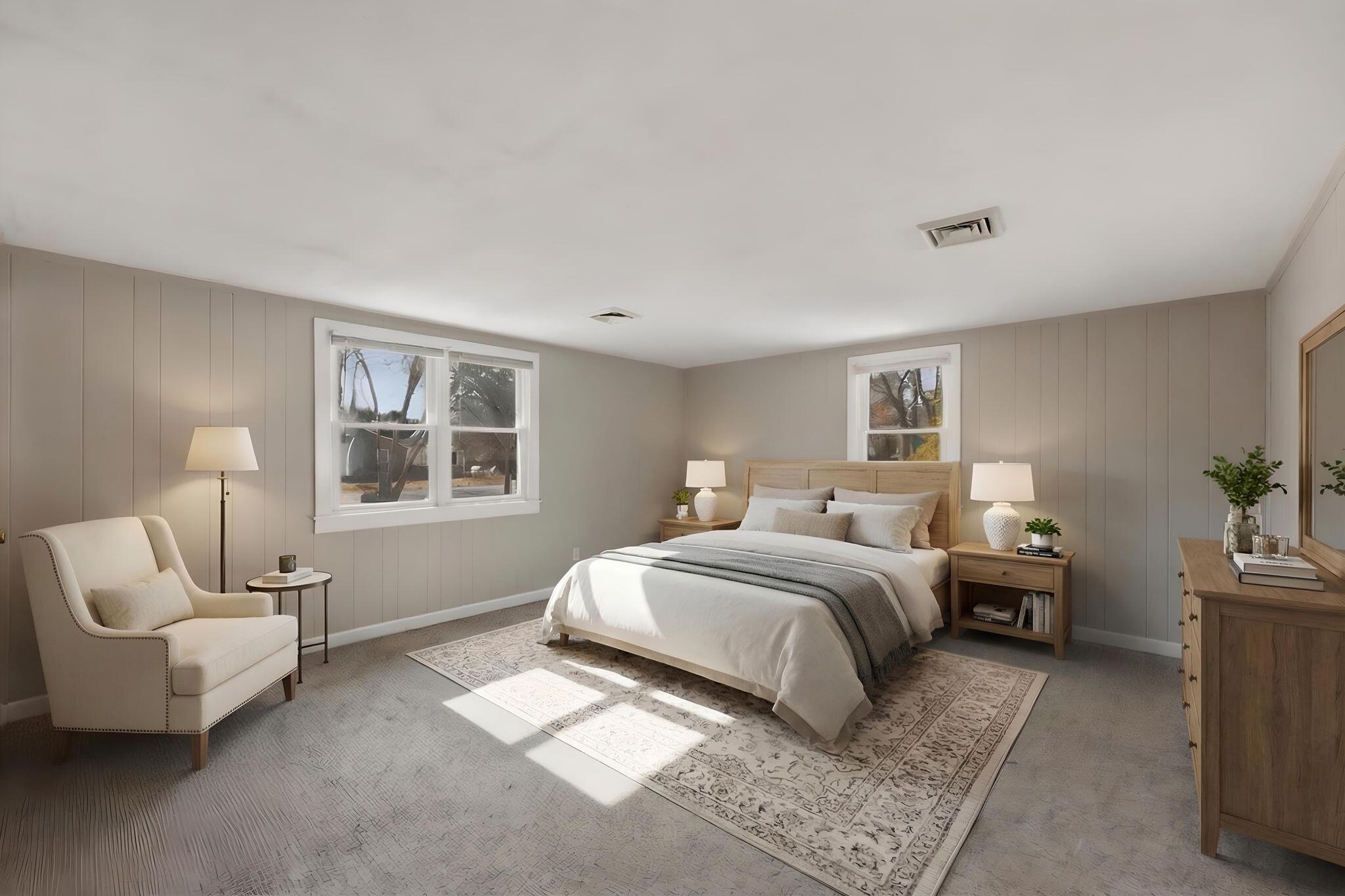 26 Howes Road South Yarmouth, MA 02664 - Photo 19 of 42 a spacious bedroom with a bed and wooden floor