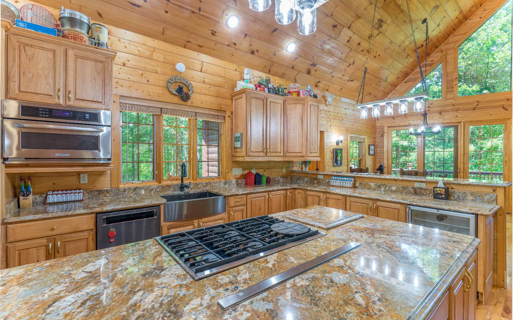 260 Berry Hl Road Murphy, NC 28906 - Photo 12 of 55 a kitchen with stainless steel appliances granite countertop a sink and cabinets