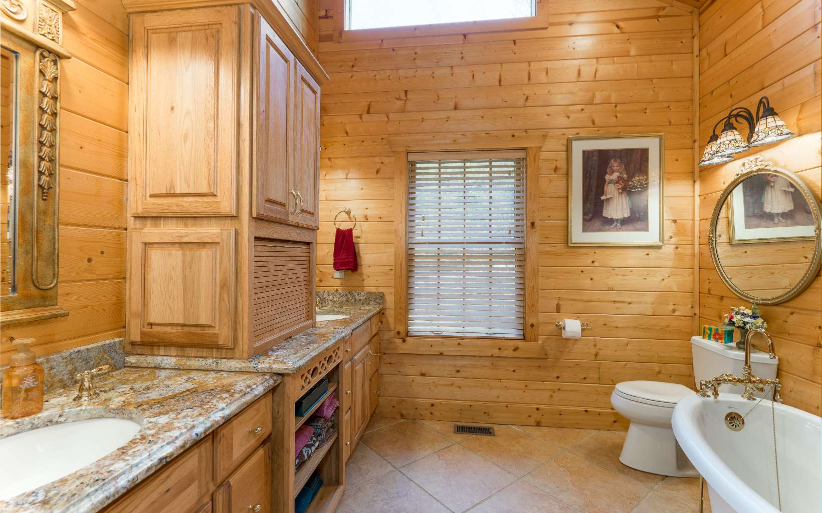 260 Berry Hl Road Murphy, NC 28906 - Photo 25 of 55 a bathroom with a granite countertop bathtub sink and mirror
