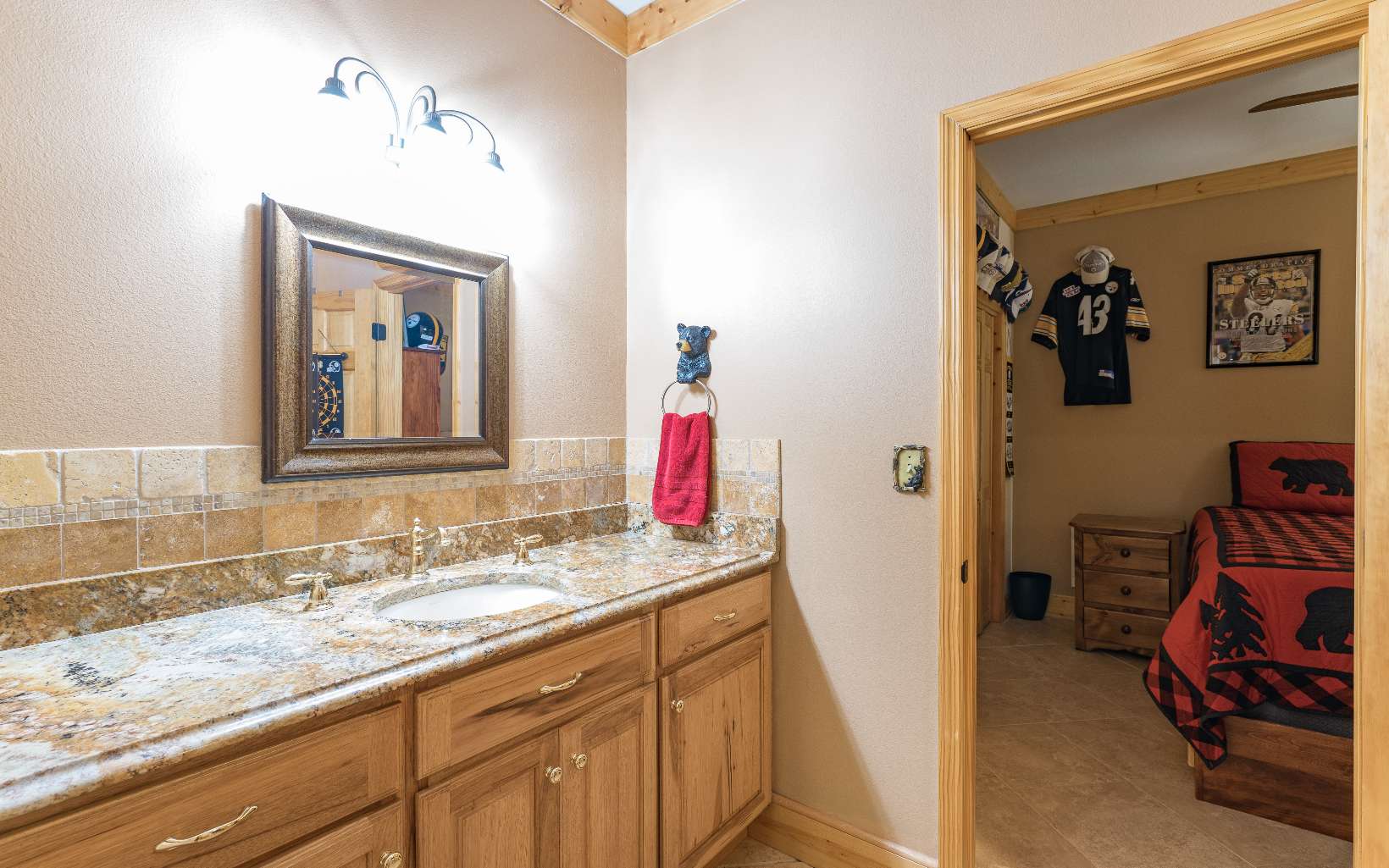 260 Berry Hl Road Murphy, NC 28906 - Photo 32 of 55 a bathroom with a sink vanity and a mirror