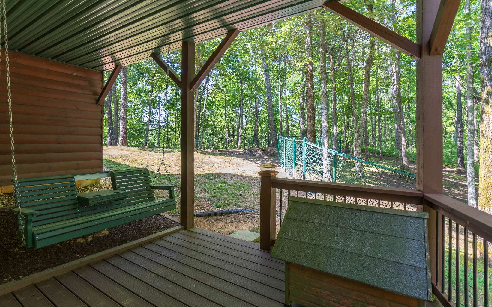 260 Berry Hl Road Murphy, NC 28906 - Photo 42 of 55 a view of a wooden deck with a yard