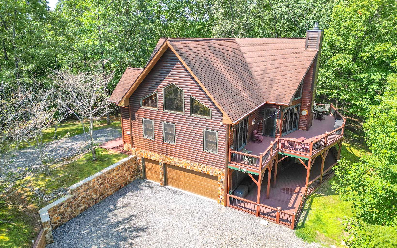 260 Berry Hl Road Murphy, NC 28906 - Photo 51 of 55 a view of a small house with roof deck front of house