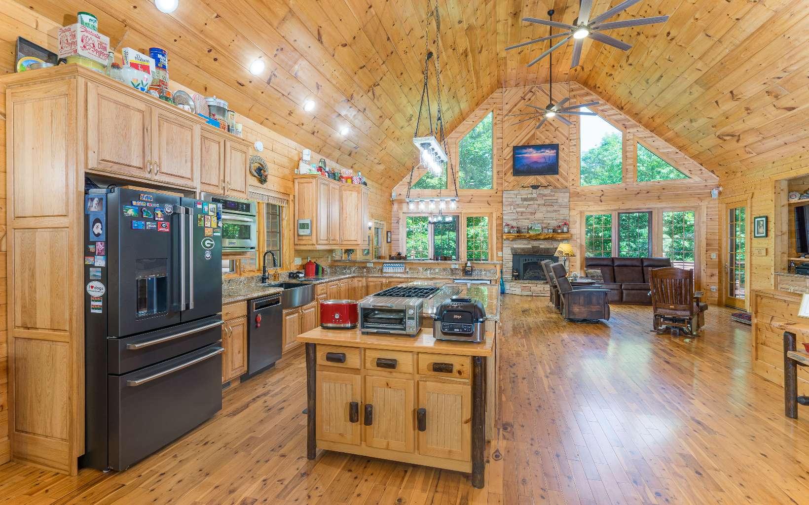 260 Berry Hl Road Murphy, NC 28906 - Photo 10 of 55 a kitchen that has a lot of cabinets a sink and a stove