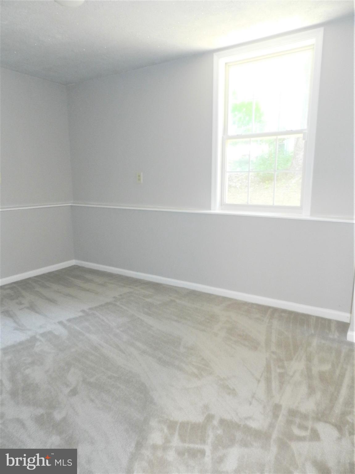 8650 Passapatanzy Road King George, VA 22485 - Photo 15 of 30 an empty room with a window