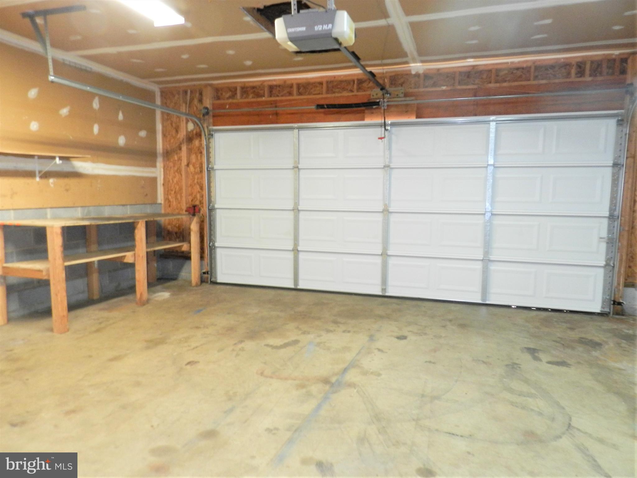 8650 Passapatanzy Road King George, VA 22485 - Photo 20 of 30 a view of an empty room with empty shelves