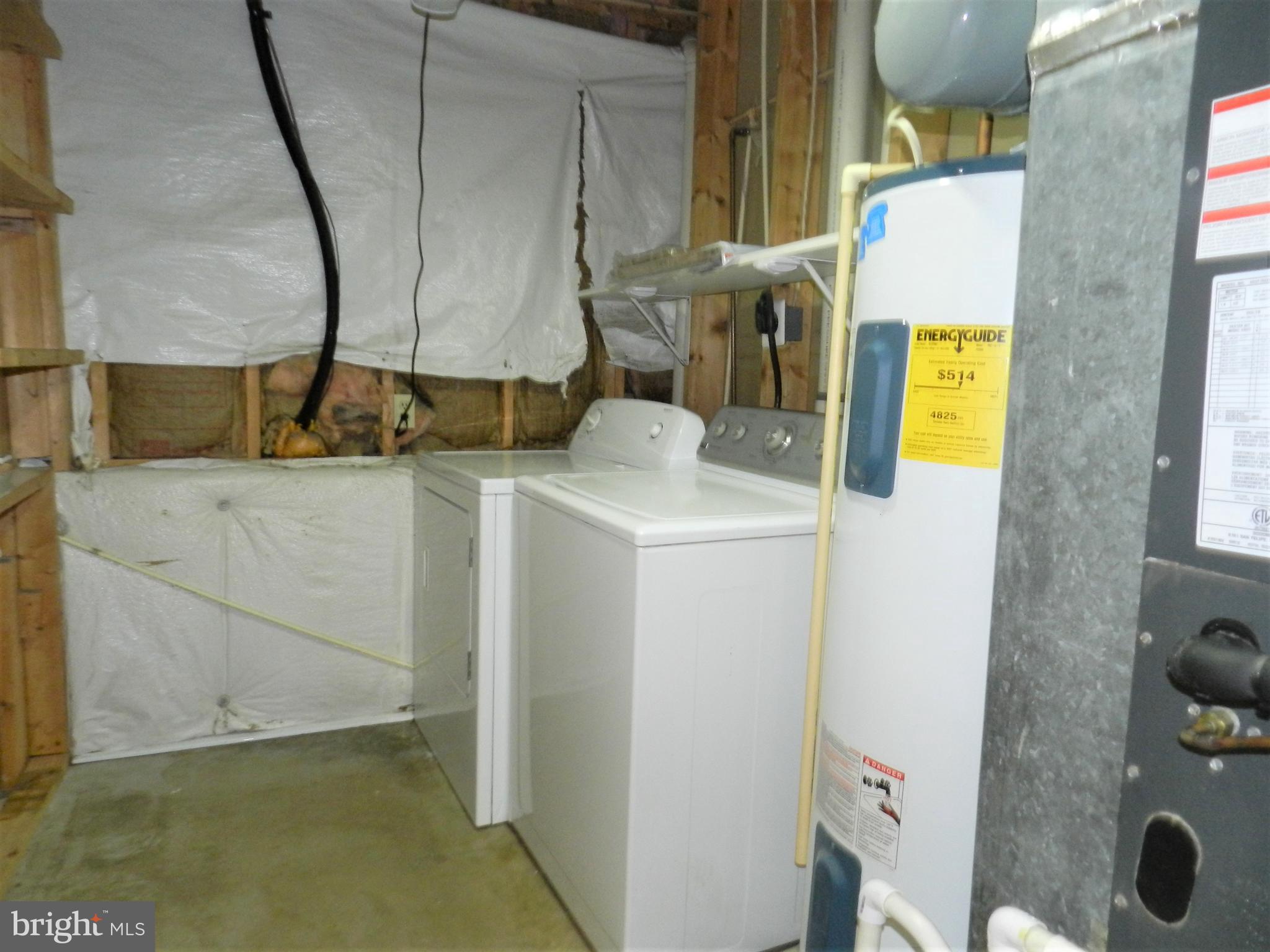 8650 Passapatanzy Road King George, VA 22485 - Photo 21 of 30 a utility room with dryer and washer