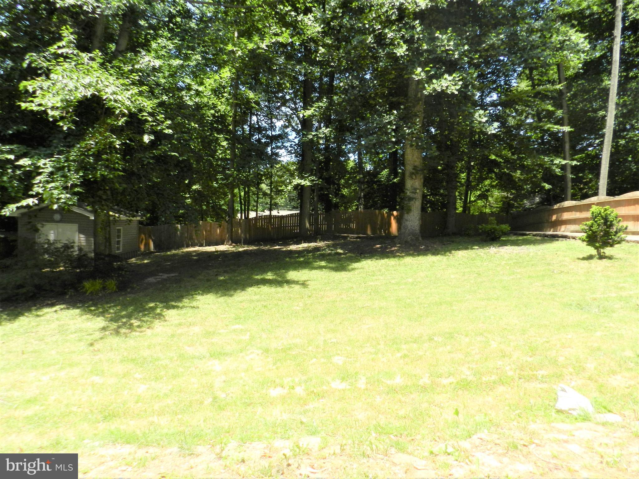 8650 Passapatanzy Road King George, VA 22485 - Photo 22 of 30 a view of swimming pool with a yard
