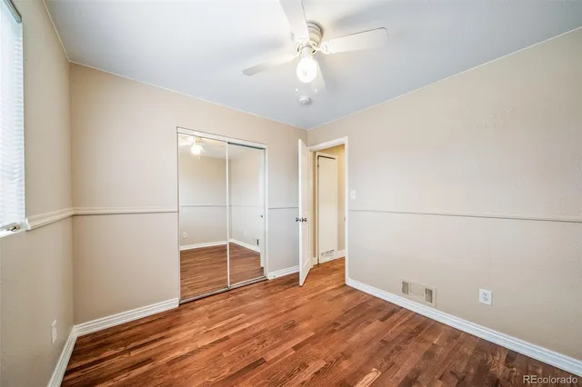 a bathroom with a bathtub toilet sink and mirror