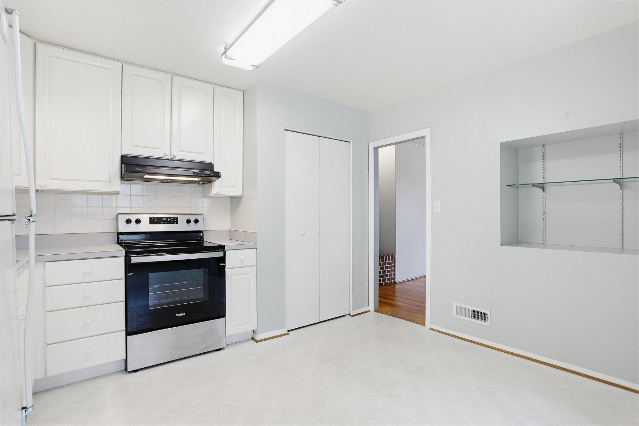 8145 Scotts Level Road Pikesville, MD 21208 - Photo 13 of 45 Modern kitchen with sleek finishes.