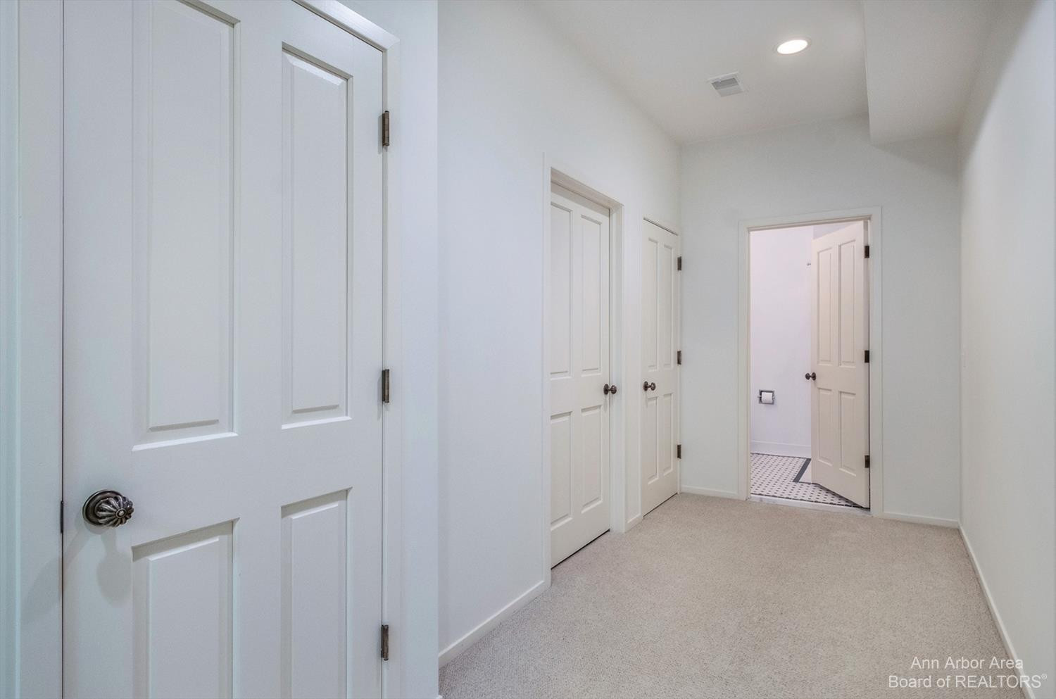 2106 Londonderry Road Ann Arbor, MI 48104 - Photo 59 of 75 Lower Level. Hallway to third full bath.