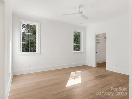 a bathroom with a double vanity sink and mirror