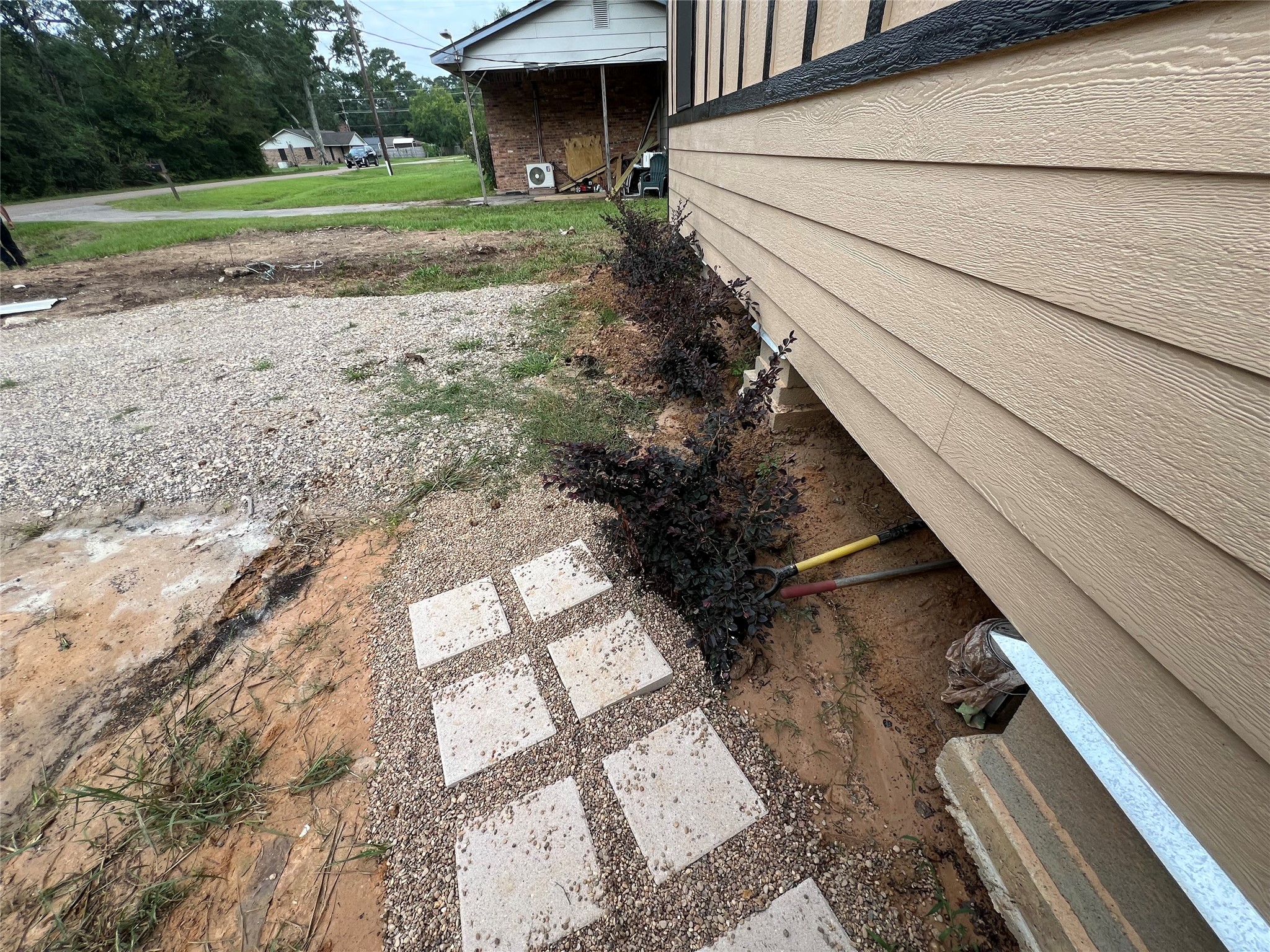 907 Daniel Street Cleveland, TX 77327 - Photo 8 of 45 Steps and plants at the entrance to stairway Front Door