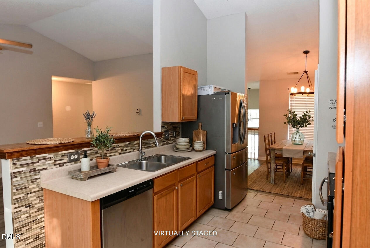 3419 Marshlane Way Raleigh, NC 27610 - Photo 6 of 26 Kitchen Staged