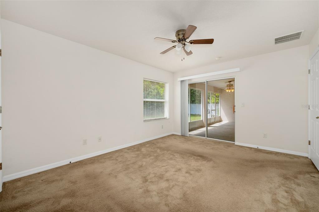 5090 Southeast 28th Street Ocala, FL 34480 - Photo 16 of 35 a view of an empty room with a window