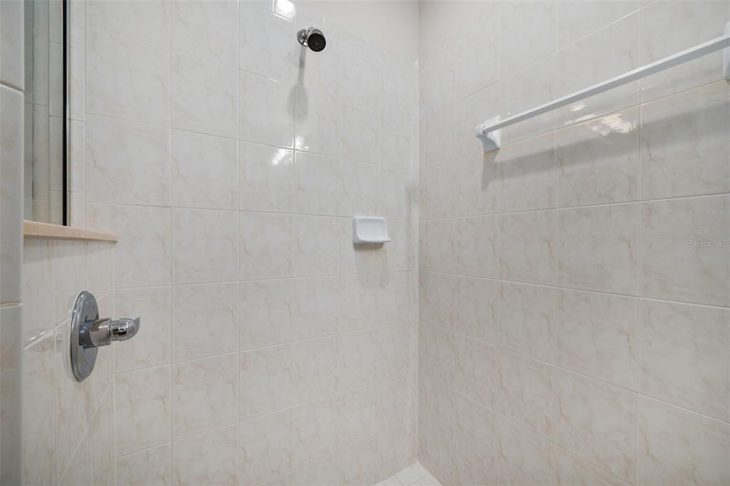 5090 Southeast 28th Street Ocala, FL 34480 - Photo 21 of 35 a bathroom with a shower