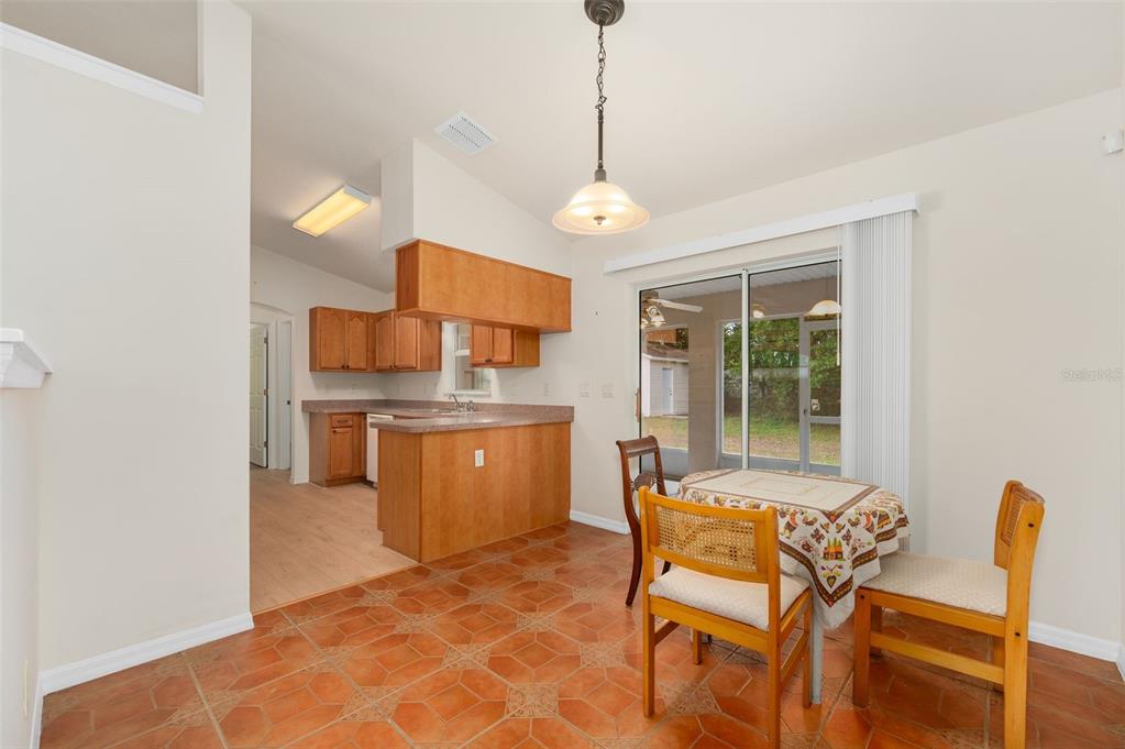 5090 Southeast 28th Street Ocala, FL 34480 - Photo 7 of 35 a dining room with furniture and window