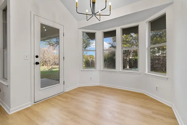 a view of empty room with front door