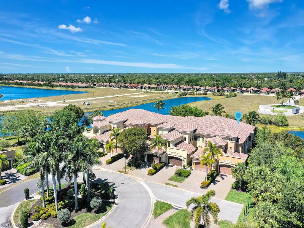 2710 Callista Court, Unit 104 Naples, FL 34114 - Photo 40 of 43 Bird's eye view featuring a water view and a residential view