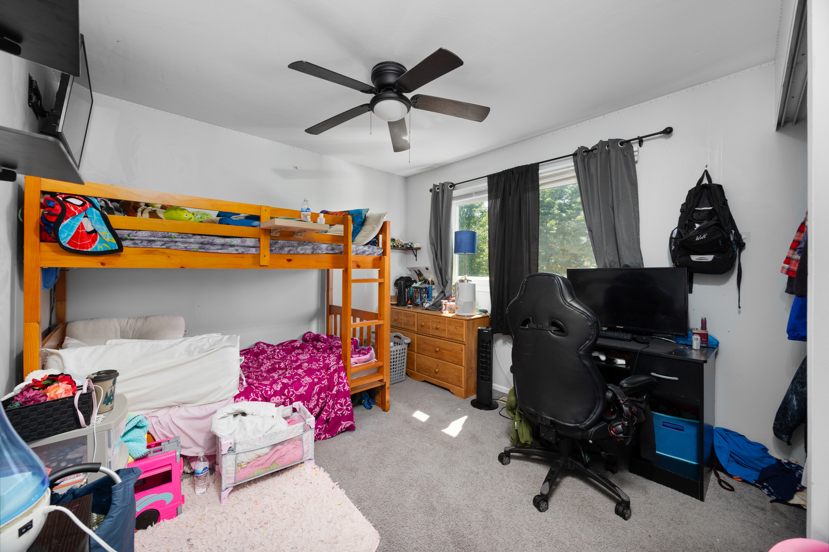 1100 Singleton Drive Roselle, IL 60172 - Photo 18 of 19 a bedroom with a bed and a window