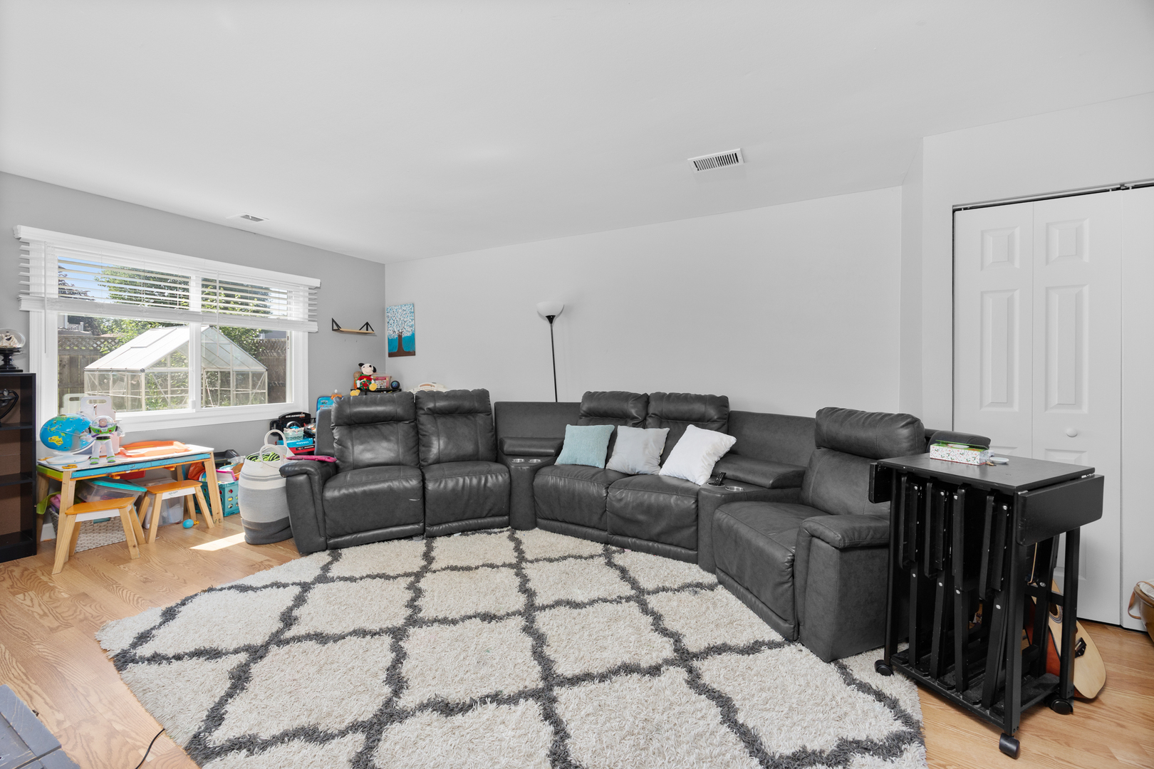 1100 Singleton Drive Roselle, IL 60172 - Photo 3 of 19 a living room with furniture and a window