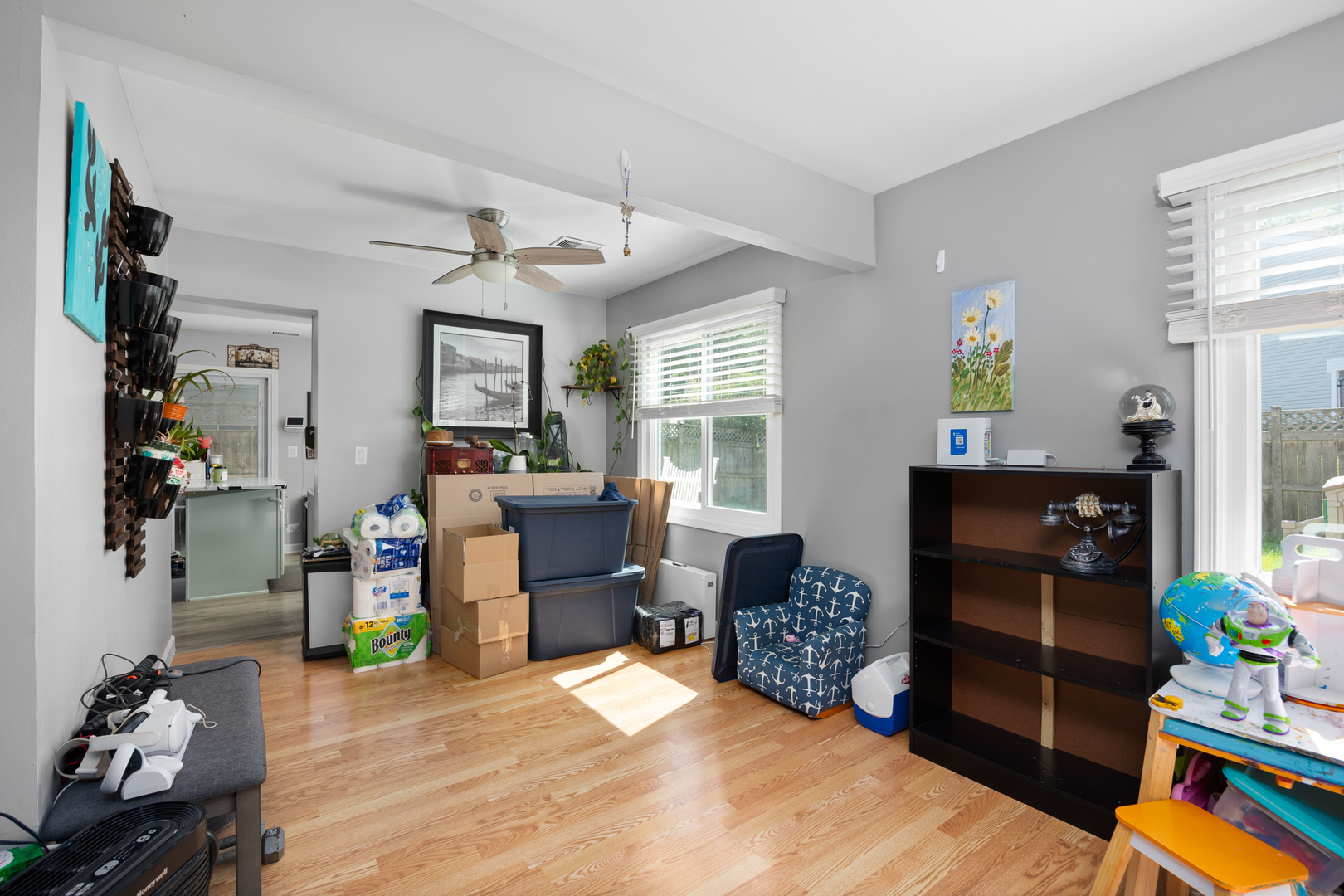 1100 Singleton Drive Roselle, IL 60172 - Photo 5 of 19 a bedroom with a bed and a dresser in it