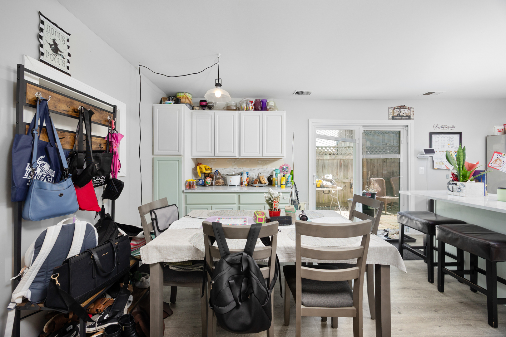 1100 Singleton Drive Roselle, IL 60172 - Photo 9 of 19 a view of a dining room with furniture window and outdoor kitchen