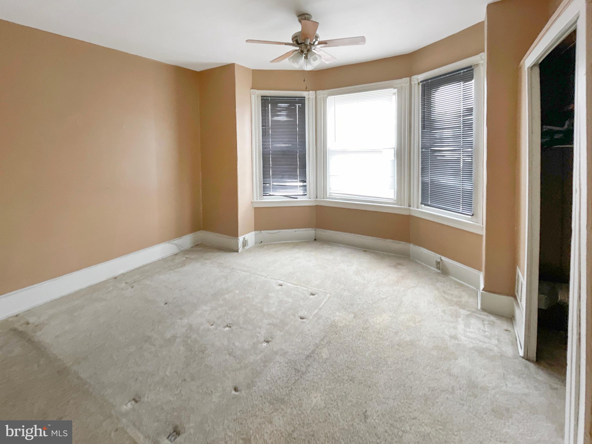 3936 North 8th Street Philadelphia, PA 19140 - Photo 9 of 10 a view of an empty room with a window