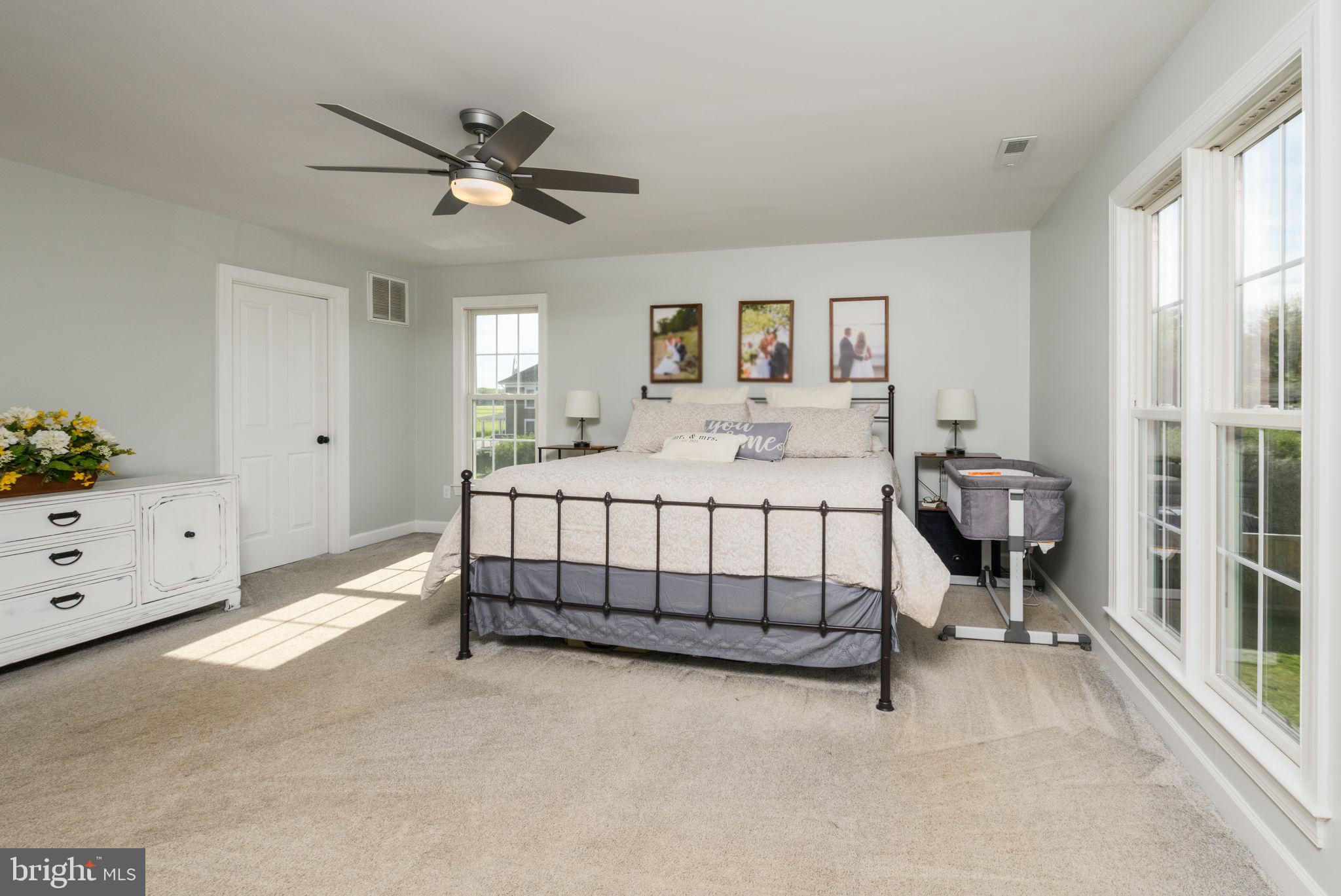 2649 Roberts Station Road Ingleside, MD 21644 - Photo 29 of 47 a bedroom with a bed and a window
