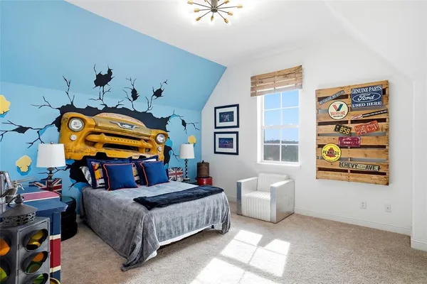 a bedroom with furniture and a baby crib