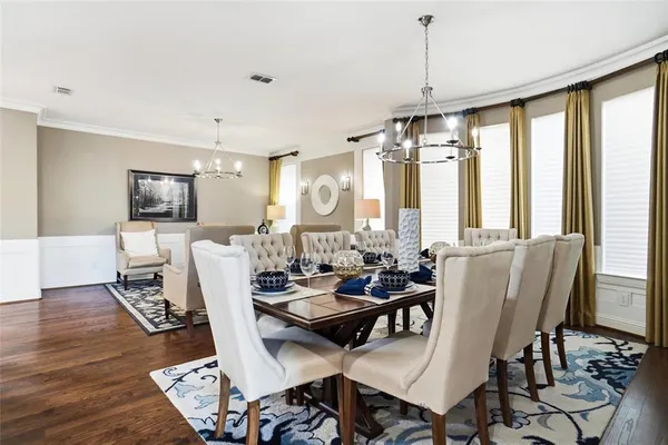 a dining room with furniture window wooden floor