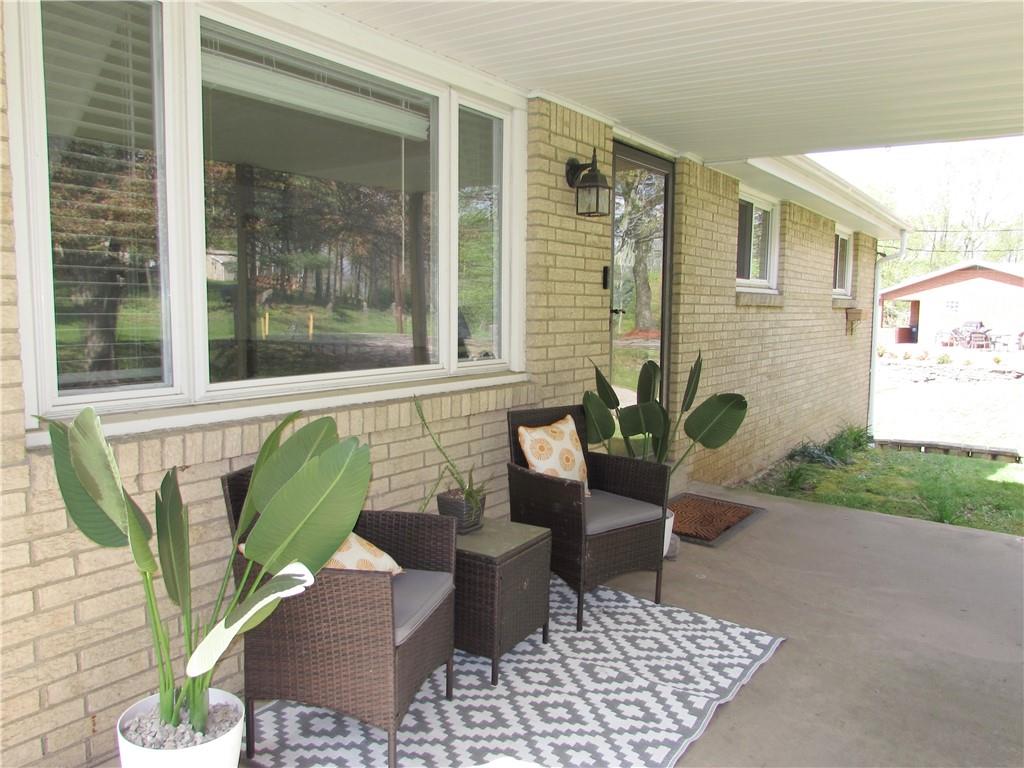 4091 Rt 130 Irwin, PA 15642 - Photo 3 of 25 You will Love Relaxing on the Wonderful Covered Front Porch.