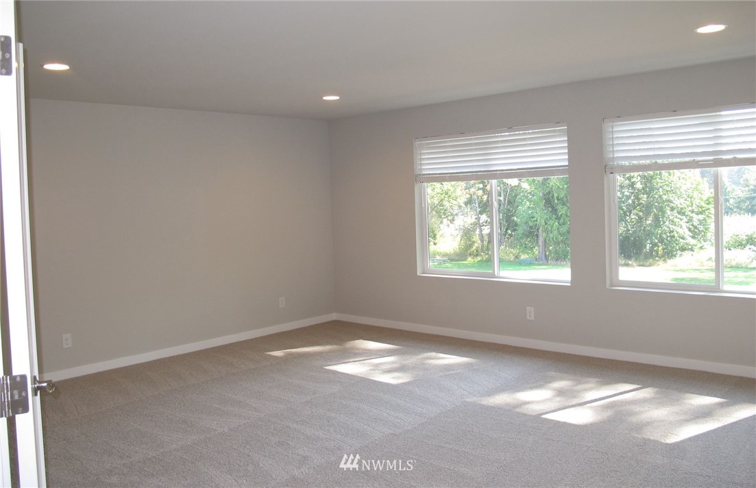 14 215th Street Southeast, Unit 13 Bothell, WA 98021 - Photo 11 of 15 a view of a big room with windows