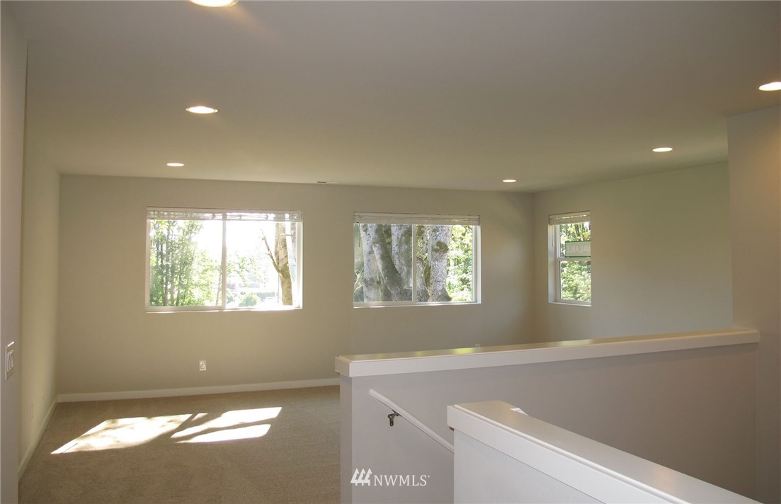 14 215th Street Southeast, Unit 13 Bothell, WA 98021 - Photo 9 of 15 a view of room and window