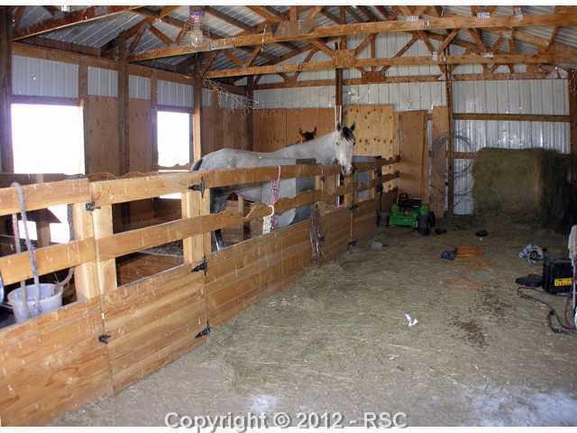 6699 McClelland Road Calhan, CO 80808 - Photo 23 of 25 Barn Inside