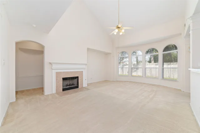 a kitchen with stainless steel appliances granite countertop a sink and a stove