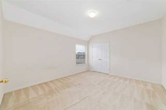 a view of a backyard with a garden