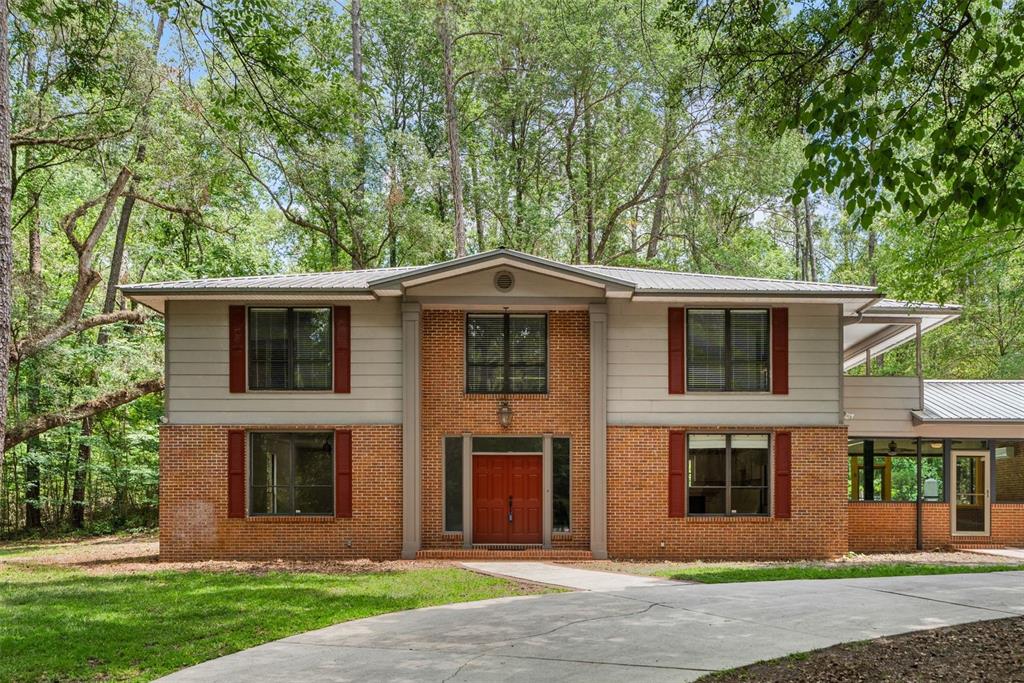 4703 Northwest 124th Street Gainesville, FL 32606 - Photo 6 of 55 front view of a house