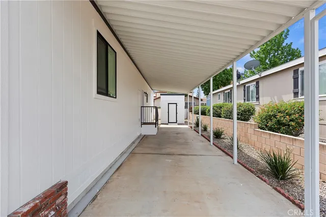 a view of a house with a street