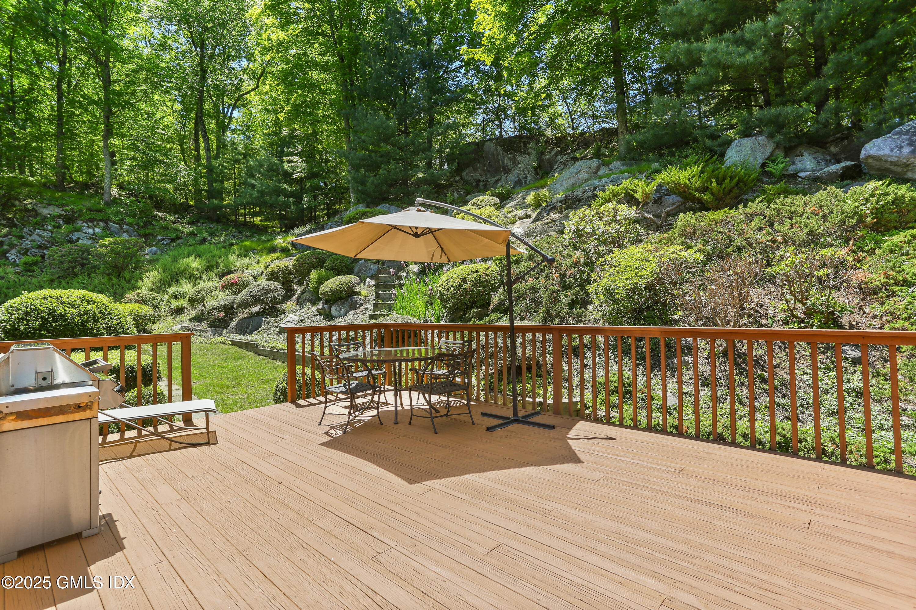 36 Horseshoe Road Cos Cob, CT 06807 - Photo 13 of 39 a view of balcony with outdoor seating and trees