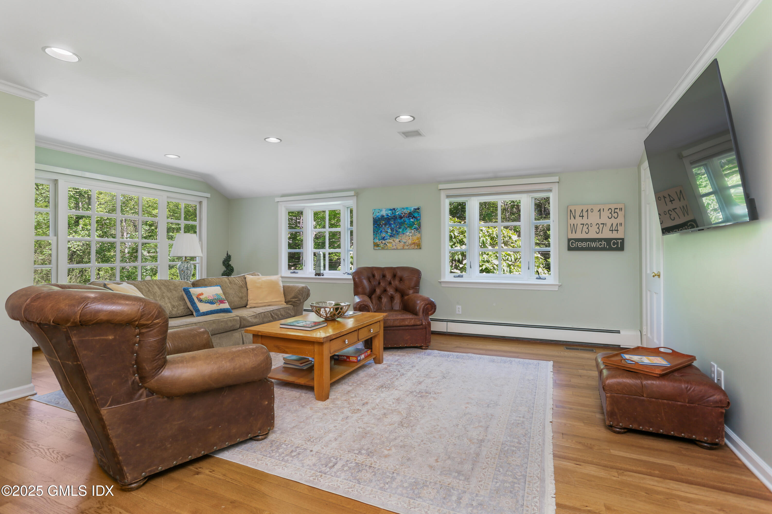 36 Horseshoe Road Cos Cob, CT 06807 - Photo 15 of 39 a living room with furniture and a window