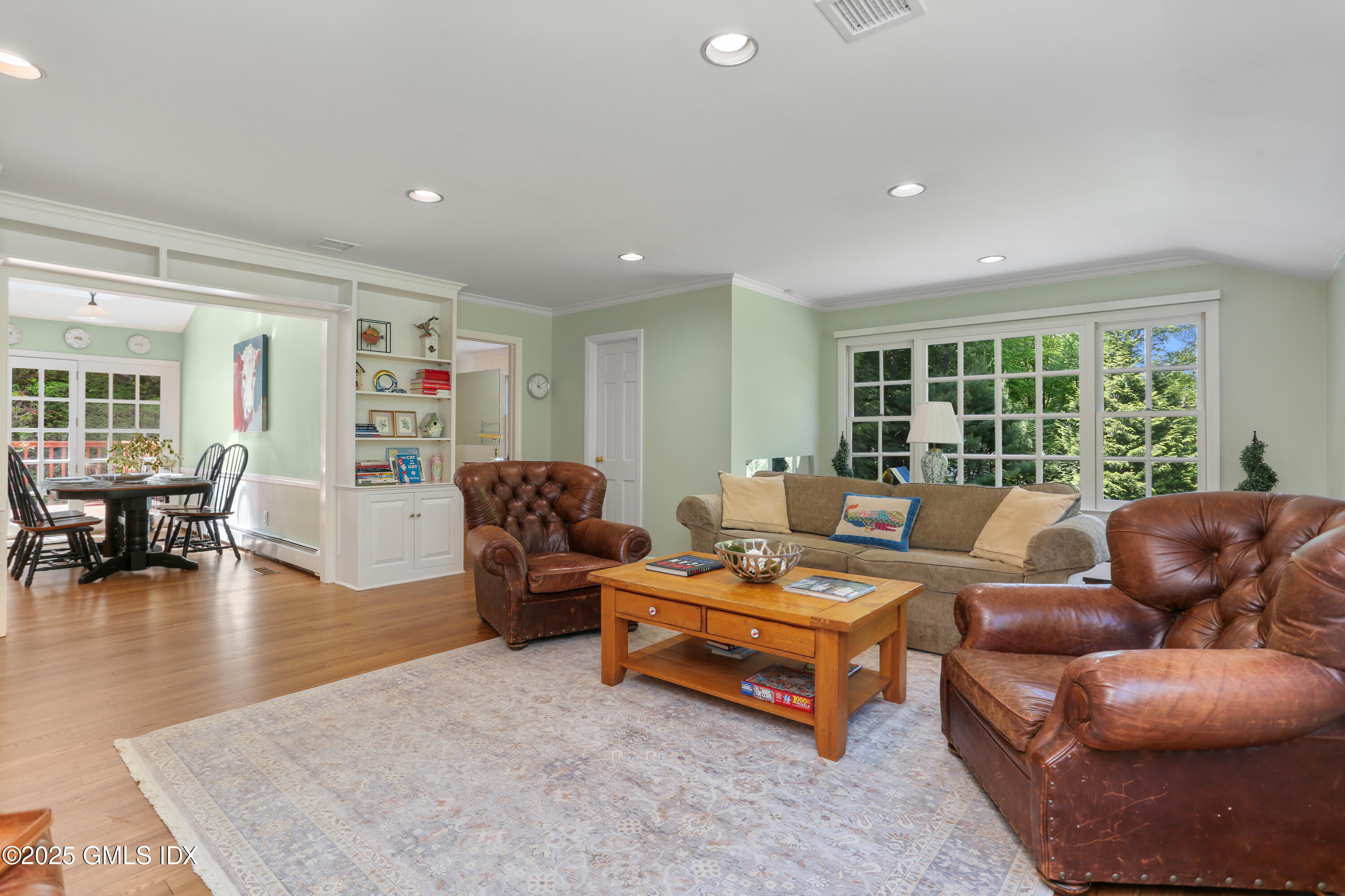 36 Horseshoe Road Cos Cob, CT 06807 - Photo 16 of 39 a living room with furniture and a large window