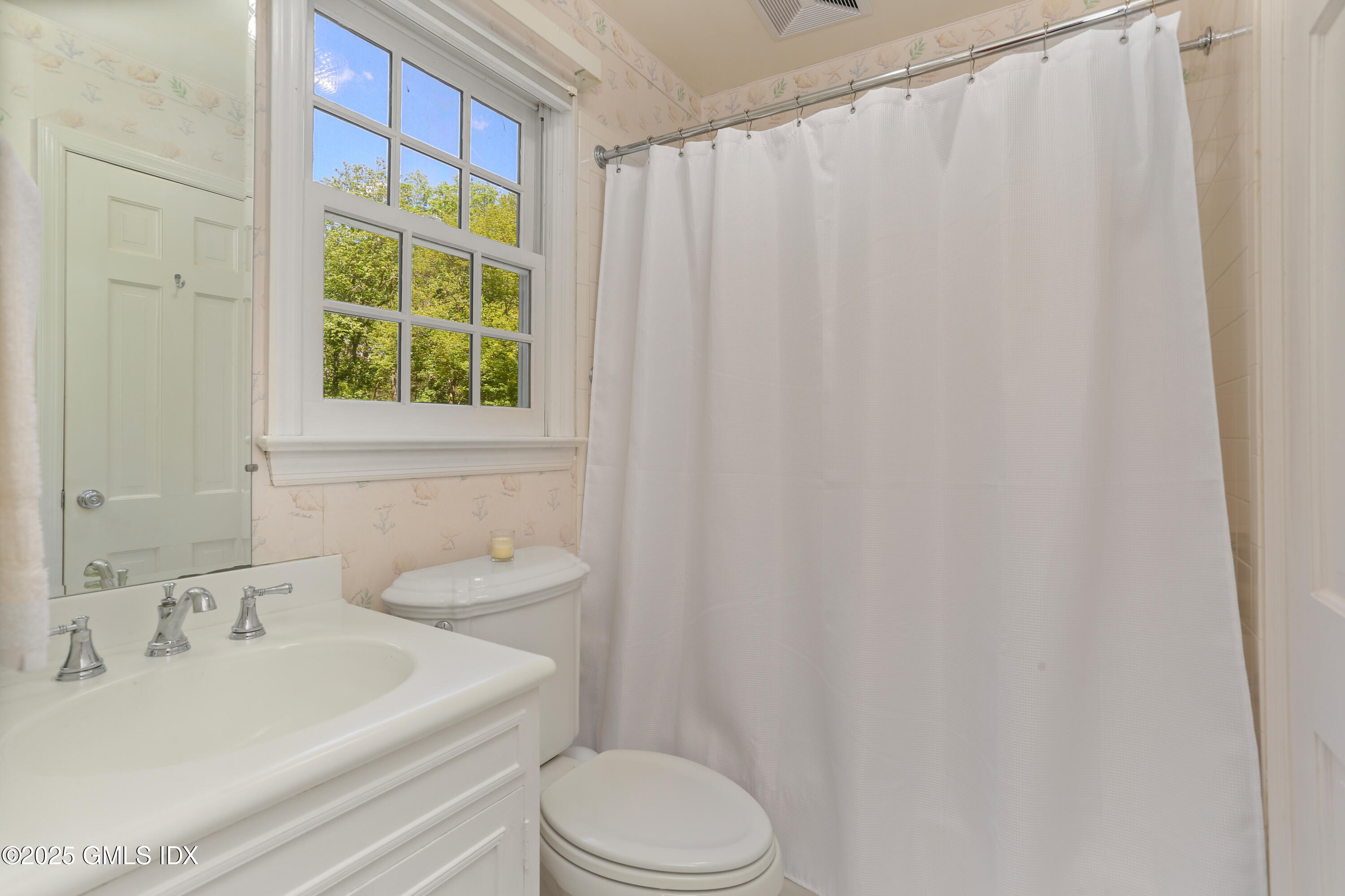 36 Horseshoe Road Cos Cob, CT 06807 - Photo 20 of 39 a bathroom with a sink toilet and shower