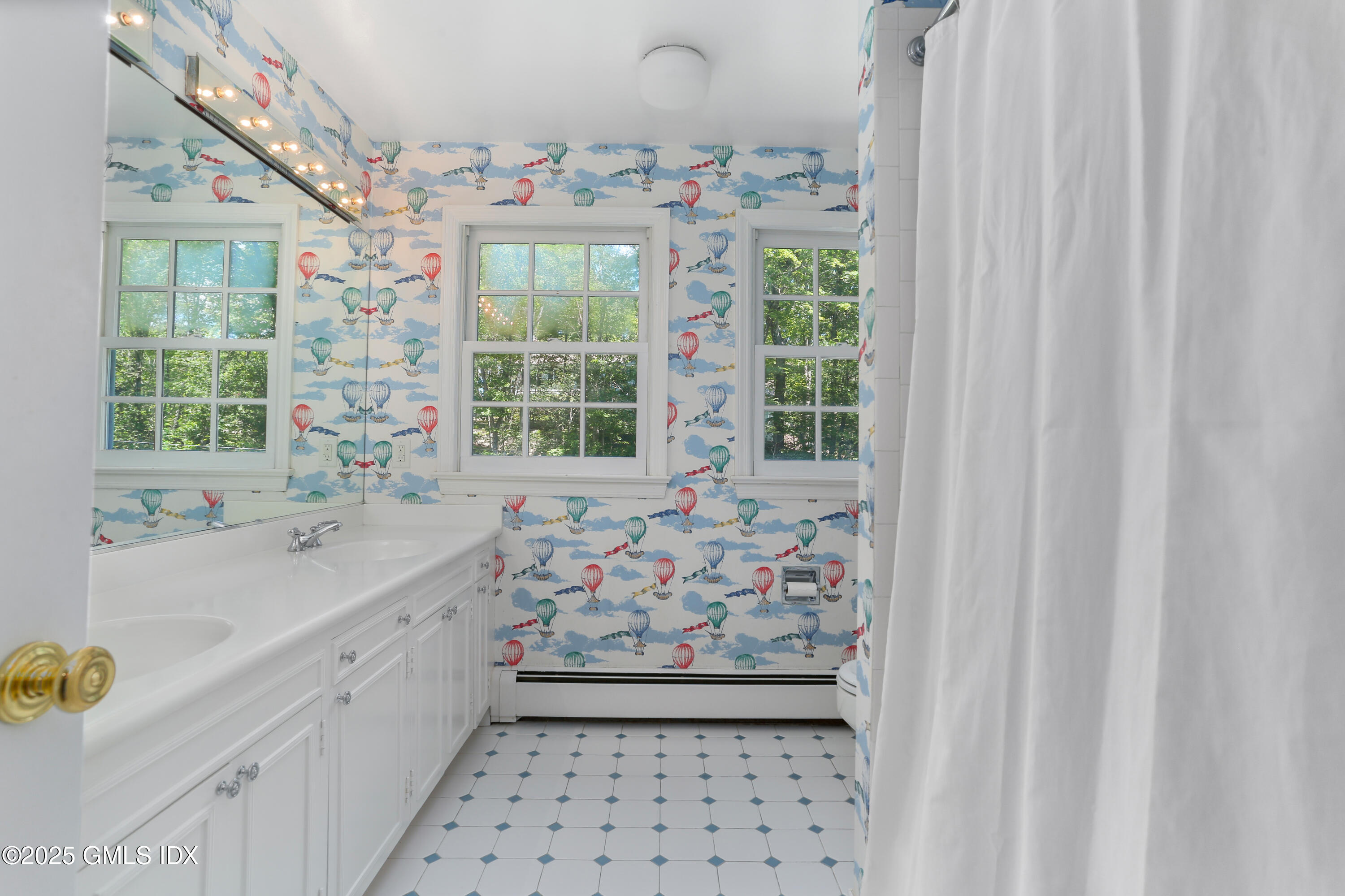 36 Horseshoe Road Cos Cob, CT 06807 - Photo 24 of 39 a bathroom with a sink a bathtub and a shower