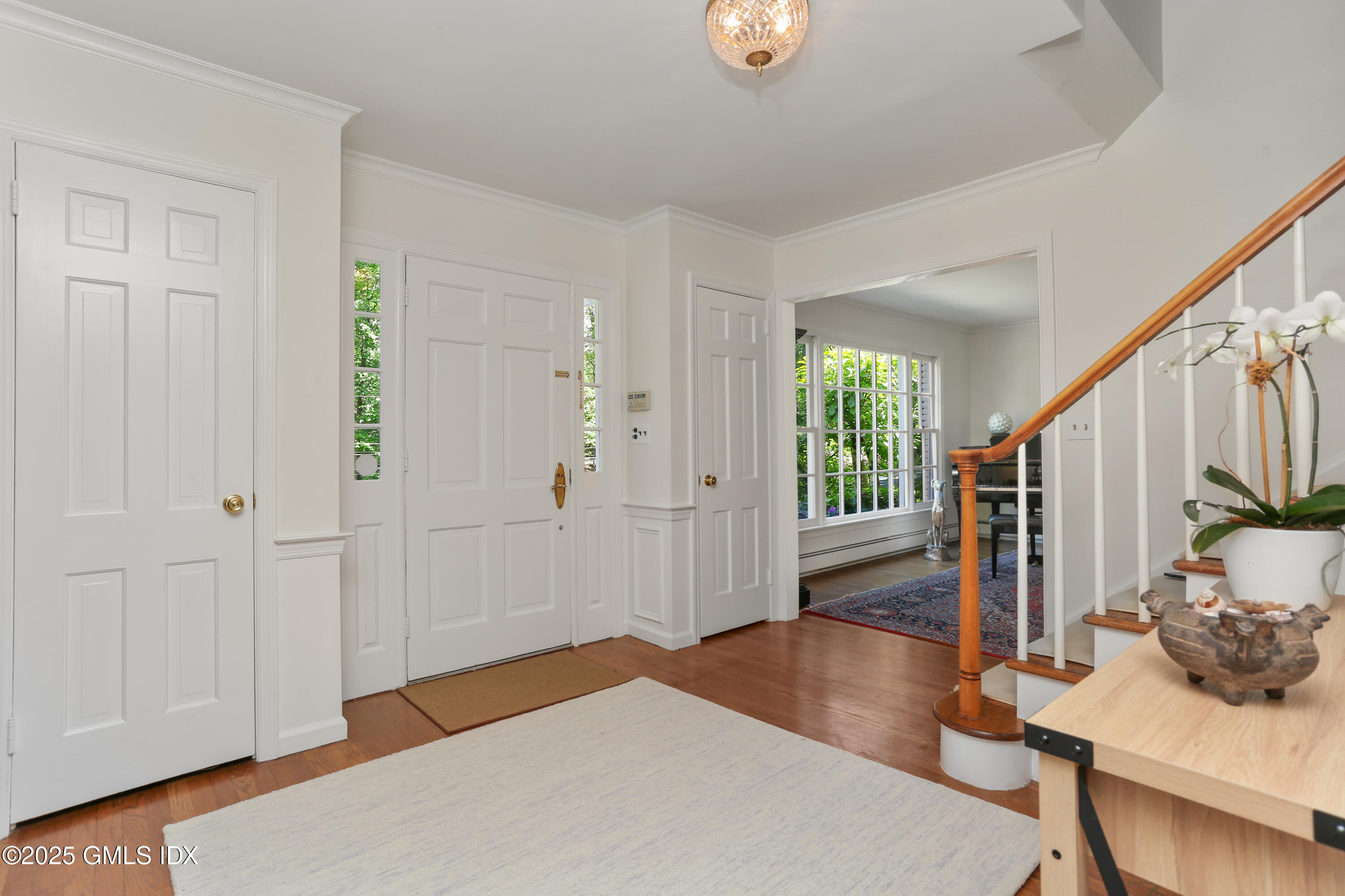 36 Horseshoe Road Cos Cob, CT 06807 - Photo 3 of 39 a bedroom with a bed and a window