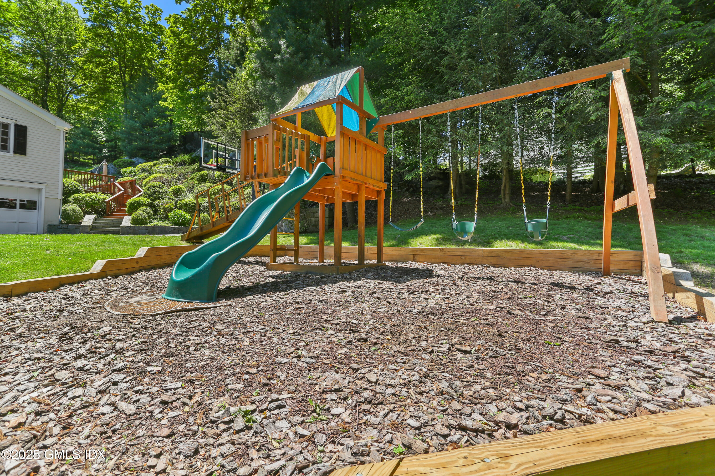 36 Horseshoe Road Cos Cob, CT 06807 - Photo 32 of 39 a view of a house with a backyard